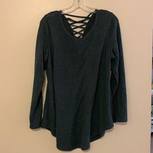Dark green sweater with lacing on back